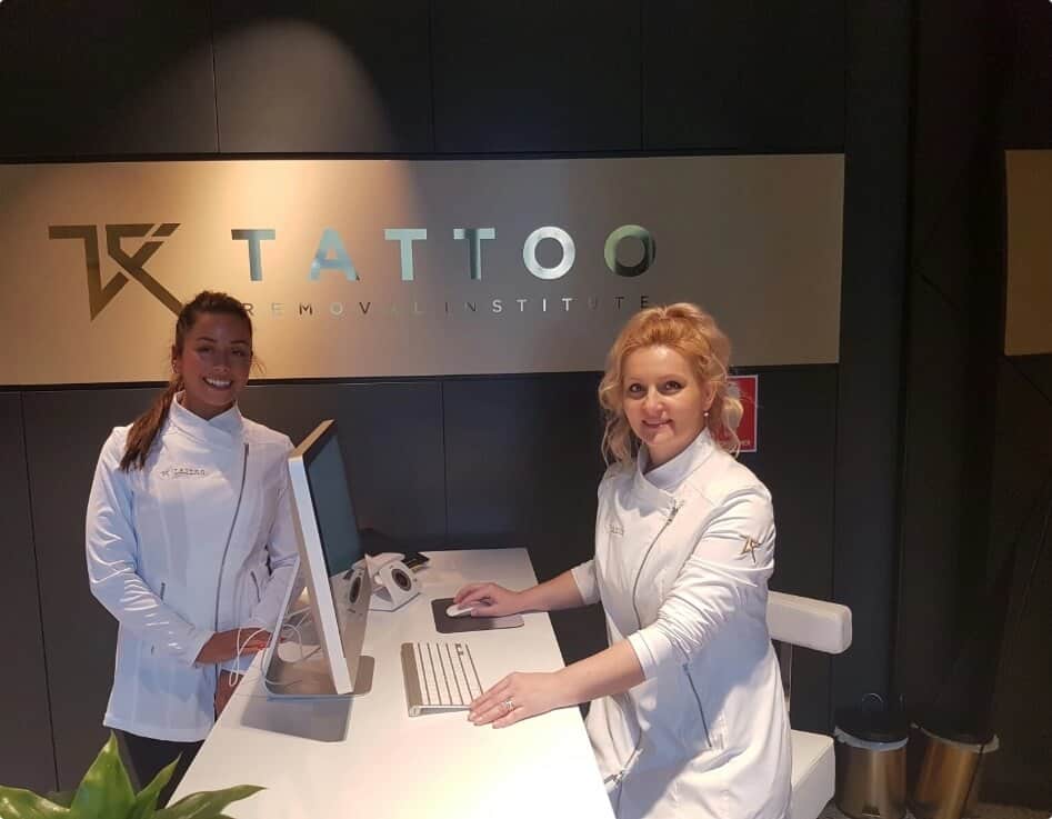 Front Desk tattoo removal institute parramatta with computer